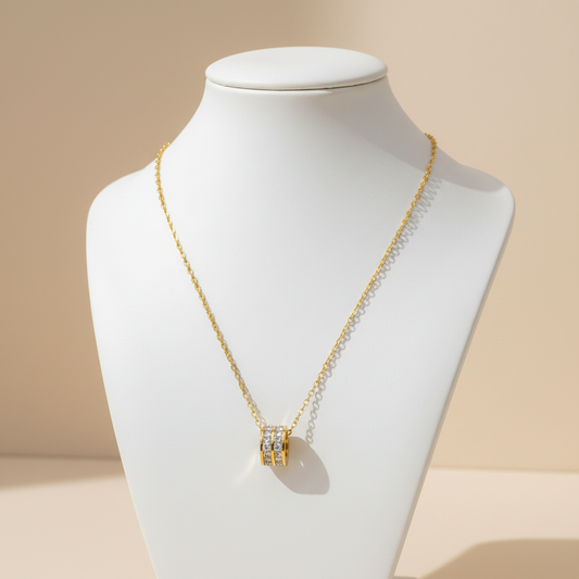 Gold Necklace on Ceramic Bust