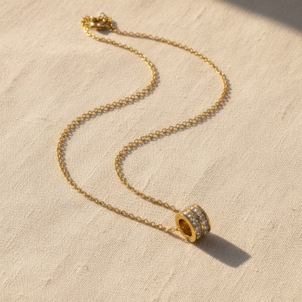 Gold Necklace on Linen